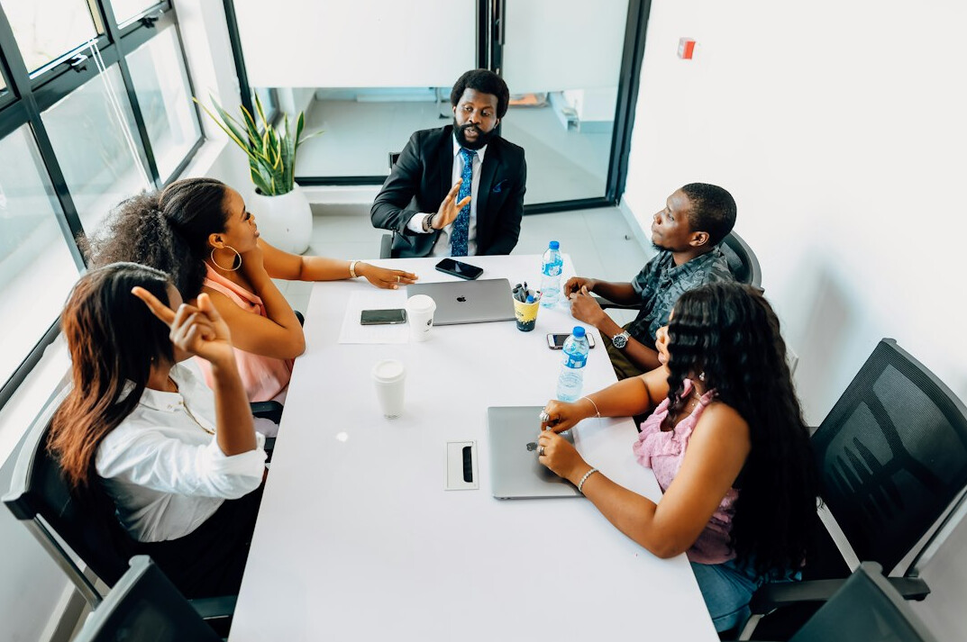 team discussing productivity